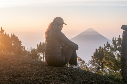 she-enjoys-nature-at-sunrise-looking-at-the-beautiful-landscape-volcan-acatenango-guatemala-stockpack-istock.jpg