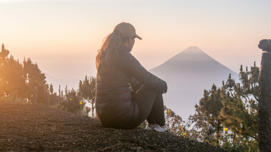 she-enjoys-nature-at-sunrise-looking-at-the-beautiful-landscape-volcan-acatenango-guatemala-stockpack-istock.jpg