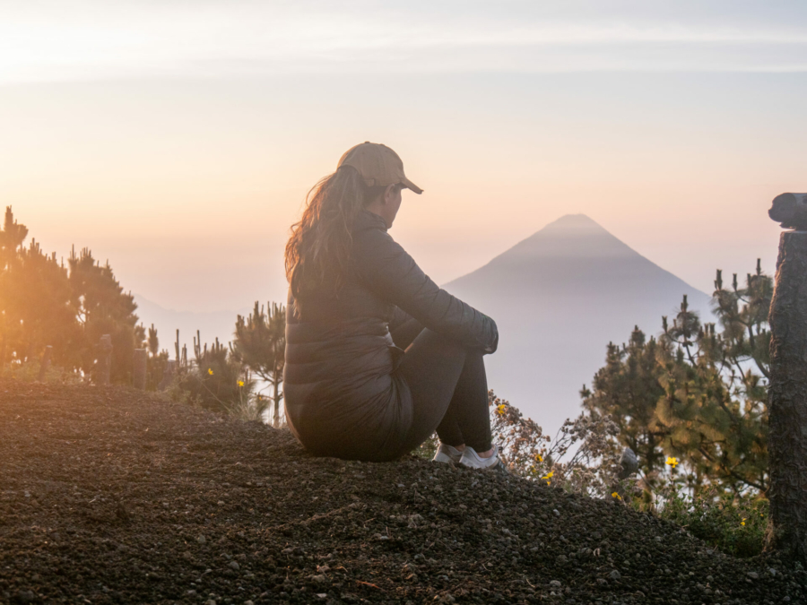 she-enjoys-nature-at-sunrise-looking-at-the-beautiful-landscape-volcan-acatenango-guatemala-stockpack-istock.jpg