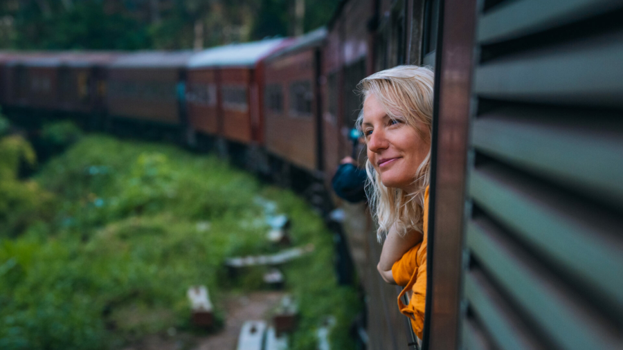 tourist-female-enjoys-a-famous-scenic-train-ride-through-sri-lanka-stockpack-istock.jpg